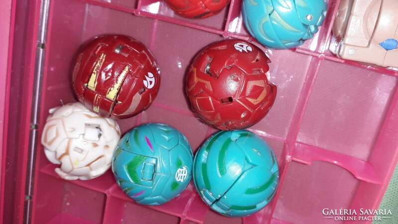 Retro original Bakugan - combat power compartment bag with 11 Bakugan in one as shown in the pictures