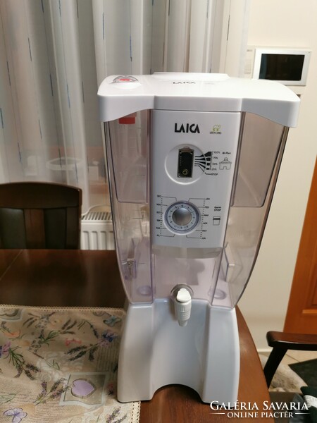 Laica green camel water dispenser with antibacterial water filter.