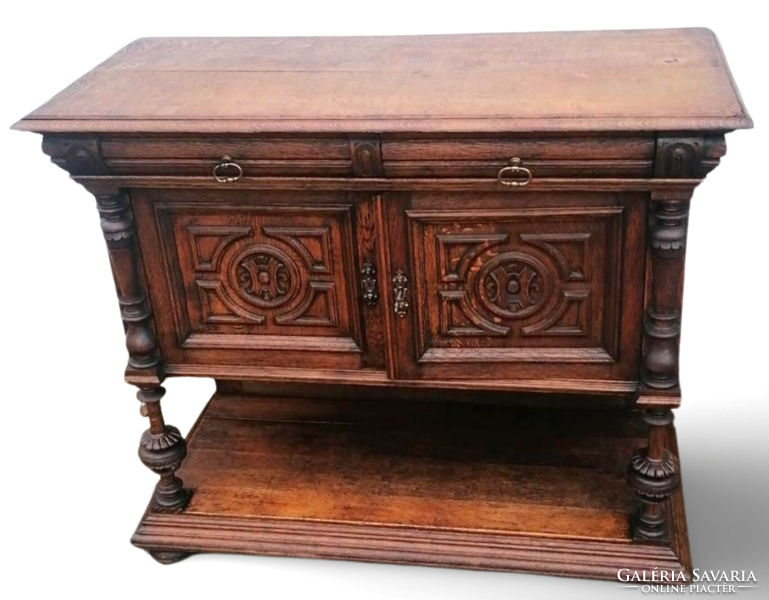 Antique Neo-Renaissance carved oak chest of drawers