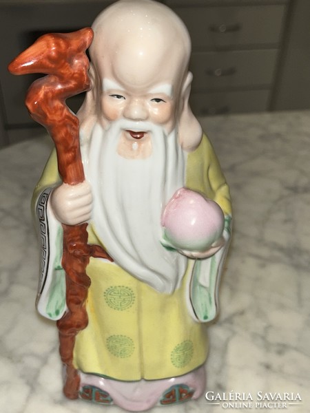 Oriental sage porcelain statue