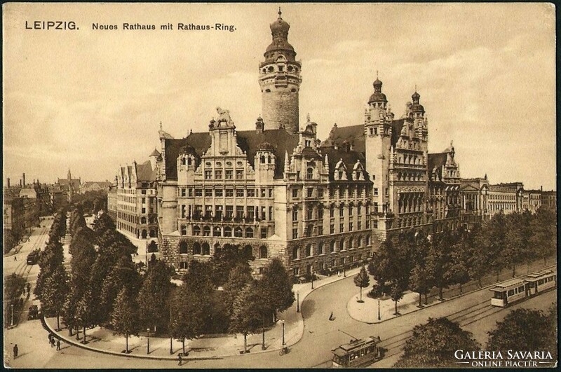 City transport in Leipzig, Germany, the town hall and the tram in front of it