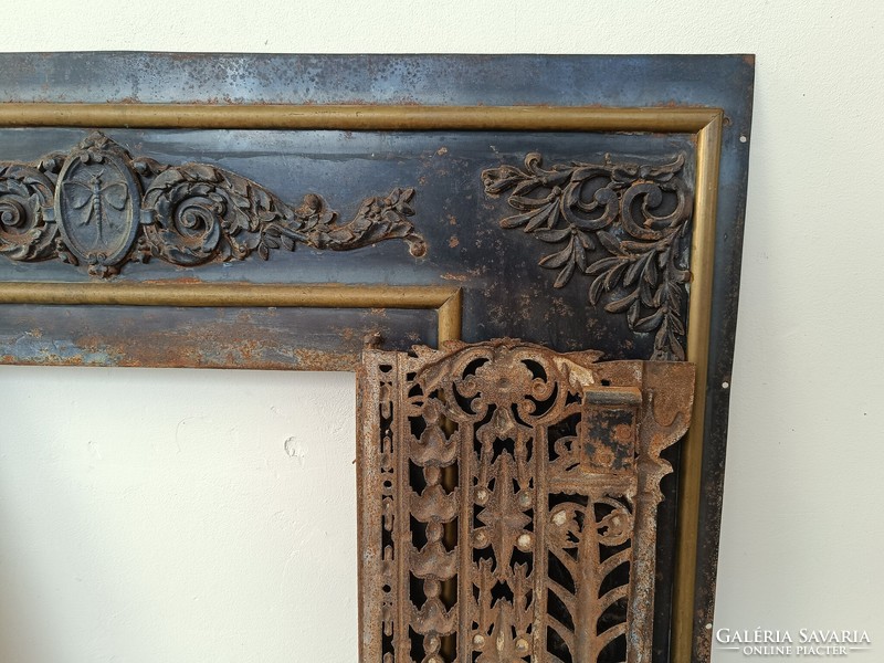 Antique metal overlay stove fireplace with cast iron door frame 8165