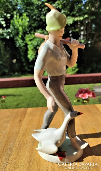 Statue of Ludas Matyi by Kőbánya porcelain factory with delta sign