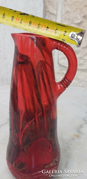 Antique Art Nouveau oxbow eosin jug. Convex round seal