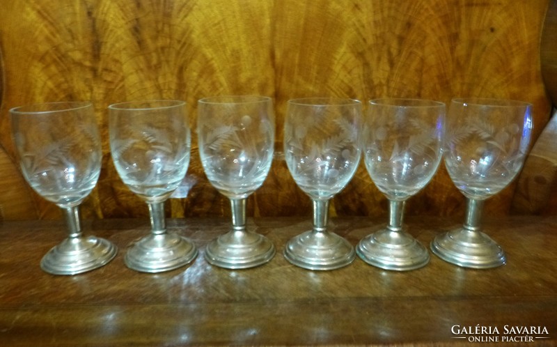 12 Pcs. Glass cup with metal base.