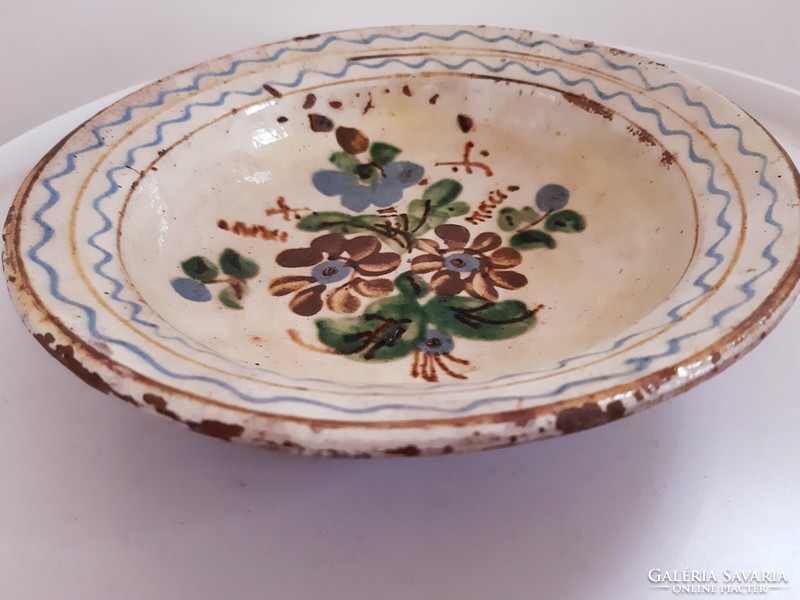 Old traditional hard earthenware plate
