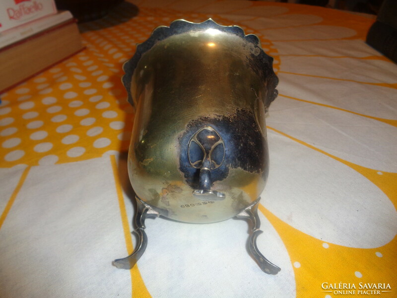 Centerpiece holder made of brass silver-plated, which is worn, three-legged, marked
