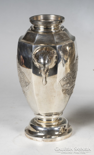 Vietnamese silver vase with plastic elephant decoration