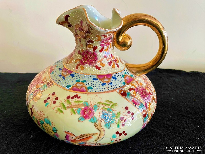 Oriental porcelain jug/spout, the xx. From the second half of the century