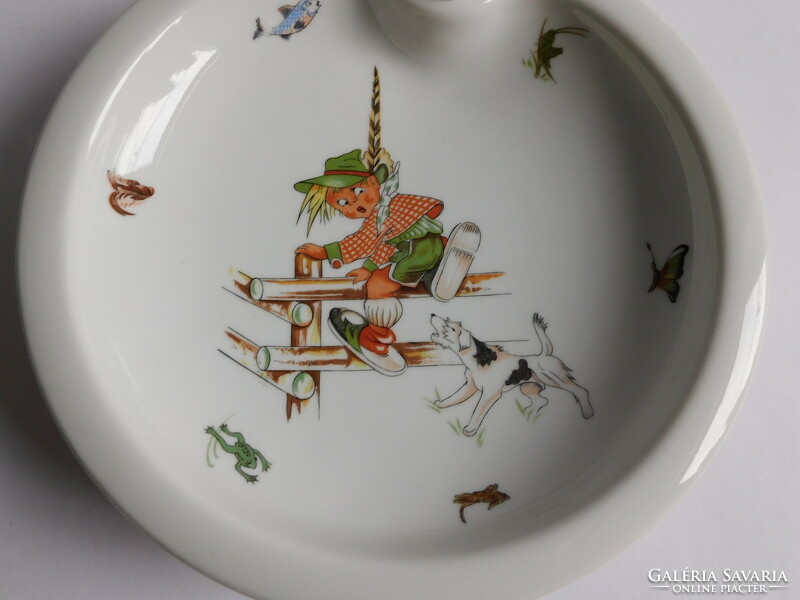 Old porcelain children's plate with a built-in warming container