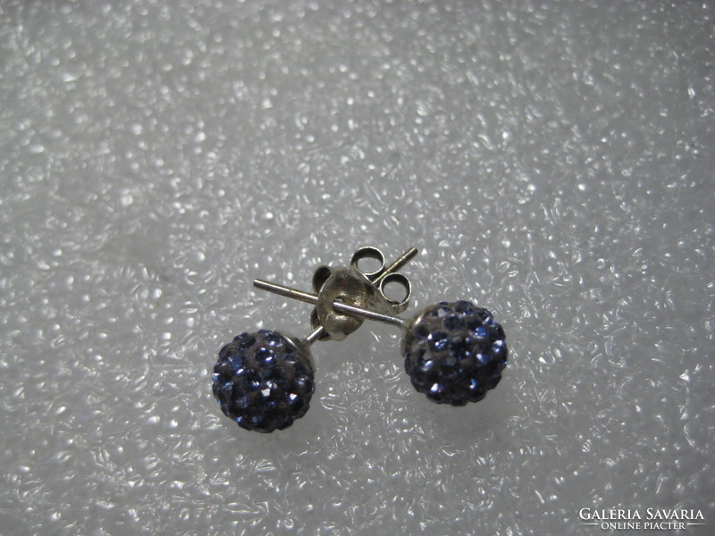 Old earrings with many small blue stones