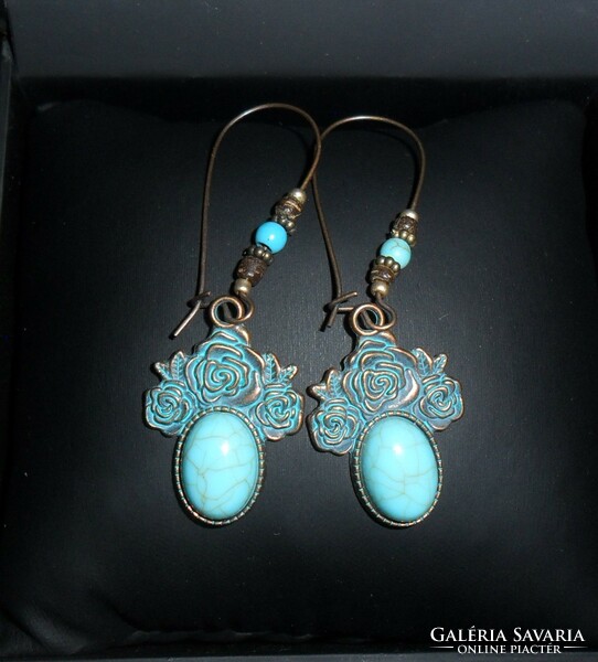 Boho-style, flower-patterned, turquoise-bronze earrings with stones.