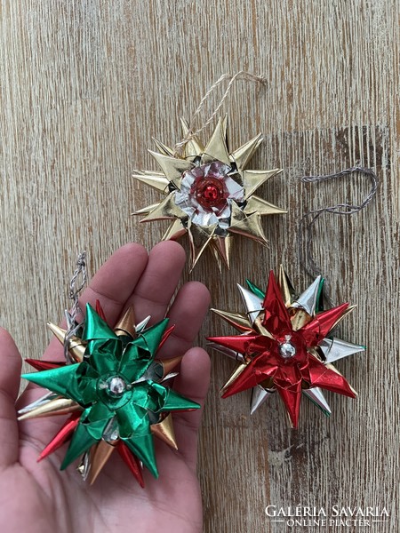 Three old paper stars Christmas tree decoration