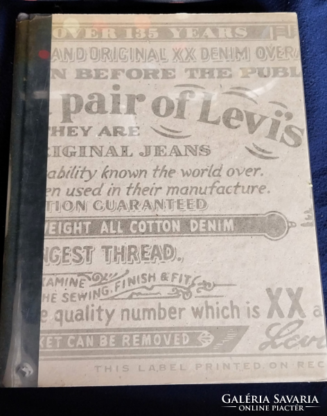 Publication of Levis 501 jeans 135th anniversary advertisement in book format (the history of jeans)