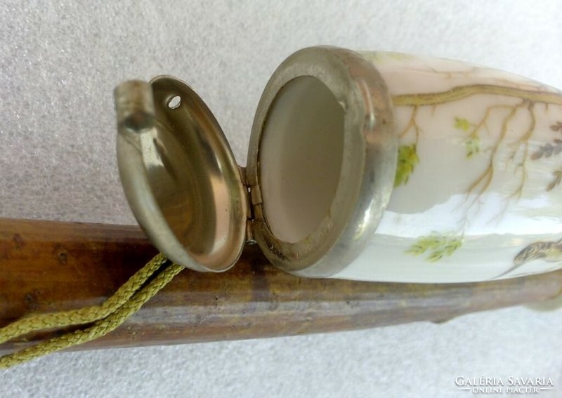 A giant wild scene porcelain pipe with an alpaca lid and a tufted cord. In perfect condition