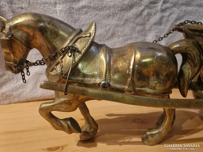 Large copper horse with chariot