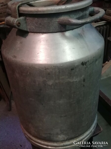 Old large aluminum milk jug, honey jug