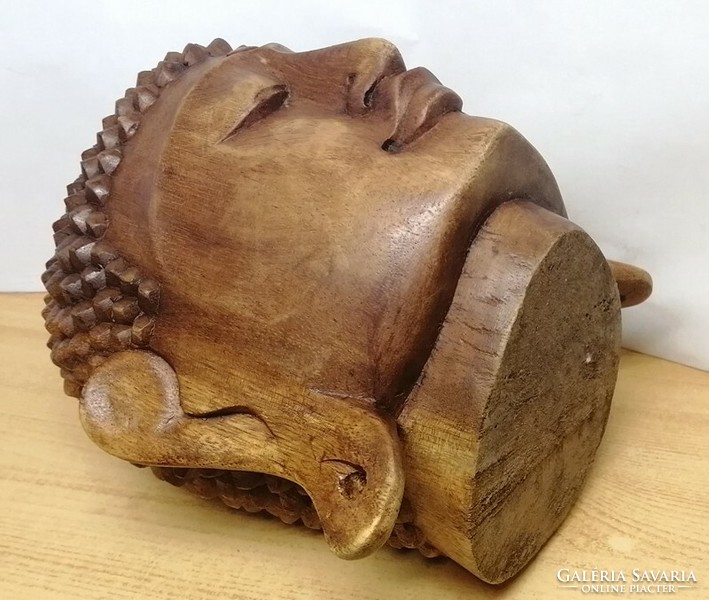 Buddha carved natural hardwood statue from Indonesia. 21 cm.