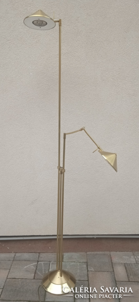 Modern design floor lamp with adjustable arm. Negotiable.