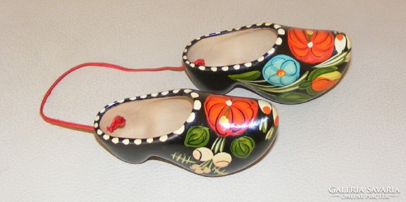 A pair of ceramic slippers