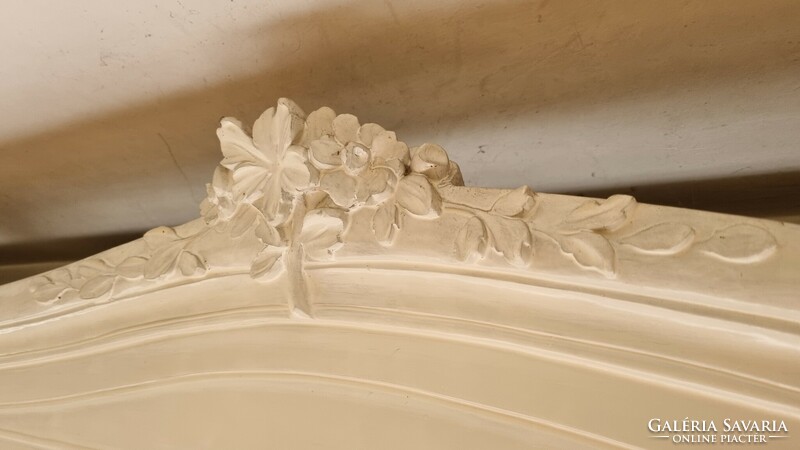 White, hand-carved wooden curtain rod with flower pattern - antique