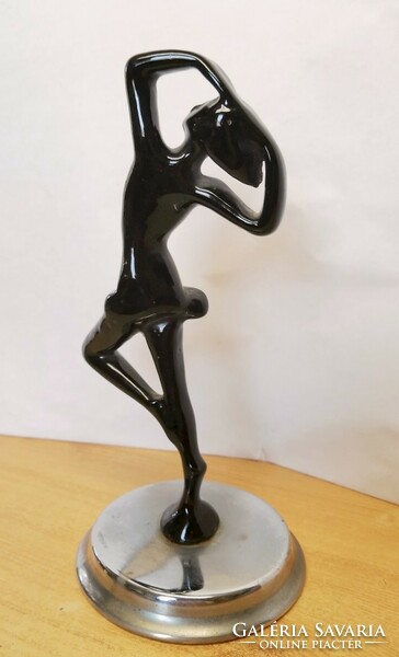 Art deco cast iron dancing lady statue on a chrome plinth. Unique piece