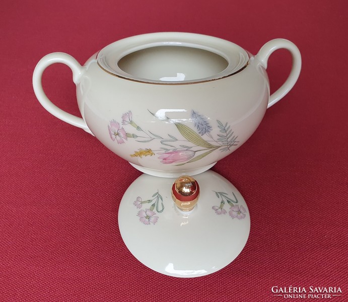 Porcelain sugar bowl with a flower pattern with a golden edge
