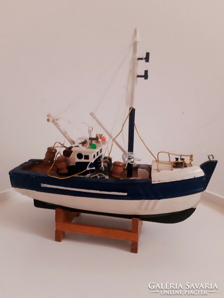 Old wooden fishing boat ornament