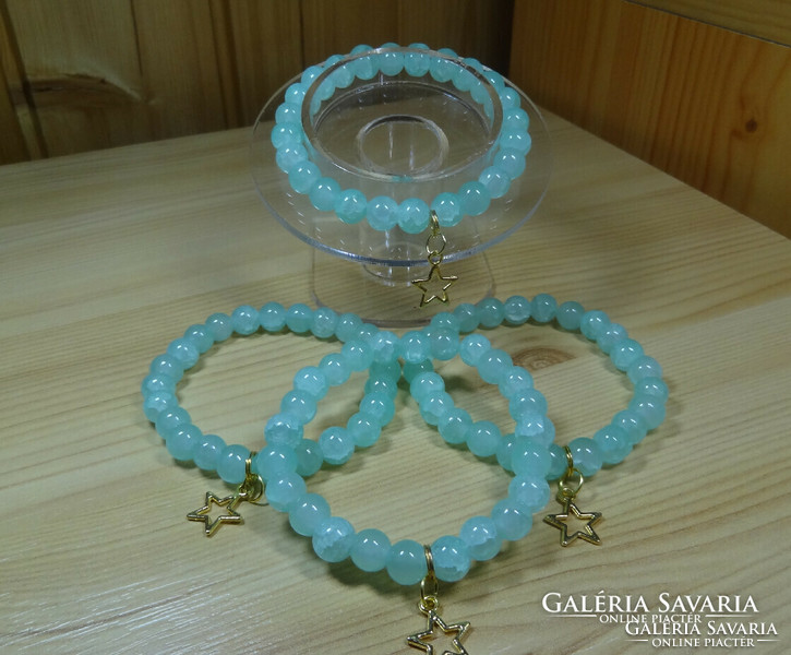 Jade mineral bracelet, with solid decoration, made of 8 mm pearls.