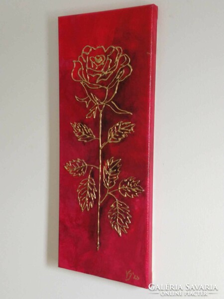 Red rose in gold