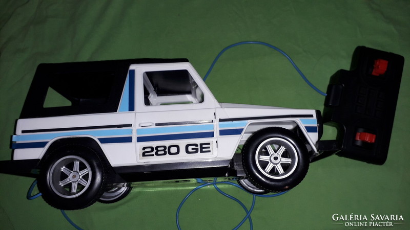 Old Yugoslavian mechanical engineering Mercedes 280 ge wire remote toy car in incredible condition