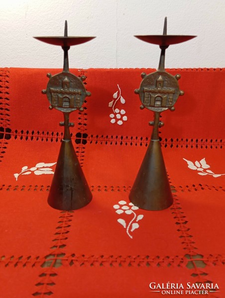 A pair of retro copper candle holders with the coat of arms of Budapest