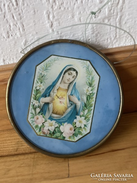 Virgin Mary in a glass