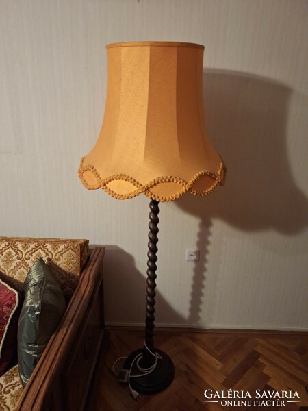 Colonial style floor lamp with golden shade