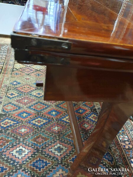 Biedermeier card table from the 1800s with a bone-colored post. It can even be used as a plain table