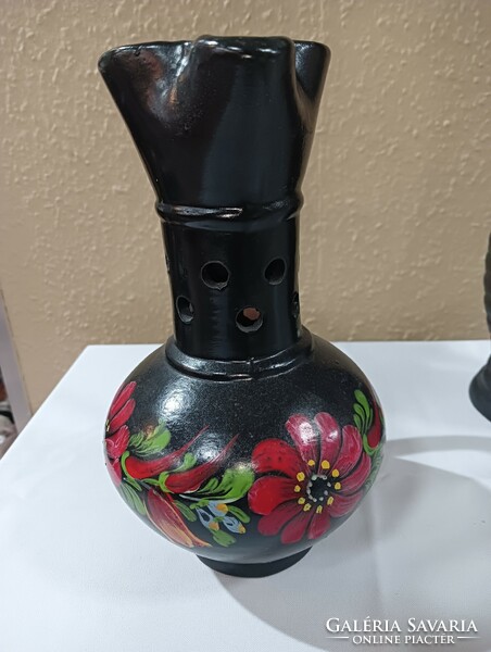 Ceramic jug with a black flower motif