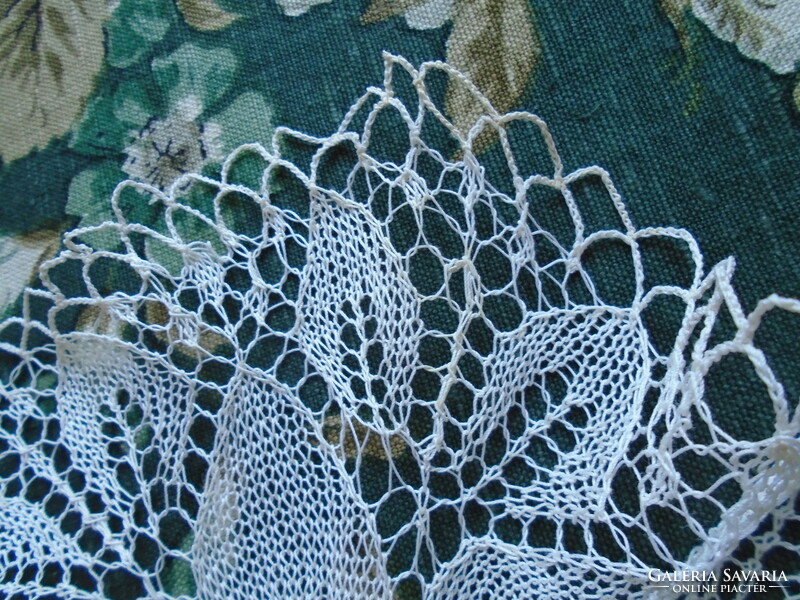 23 cm diam. Knitted, thin, ecru, flaky tablecloth.