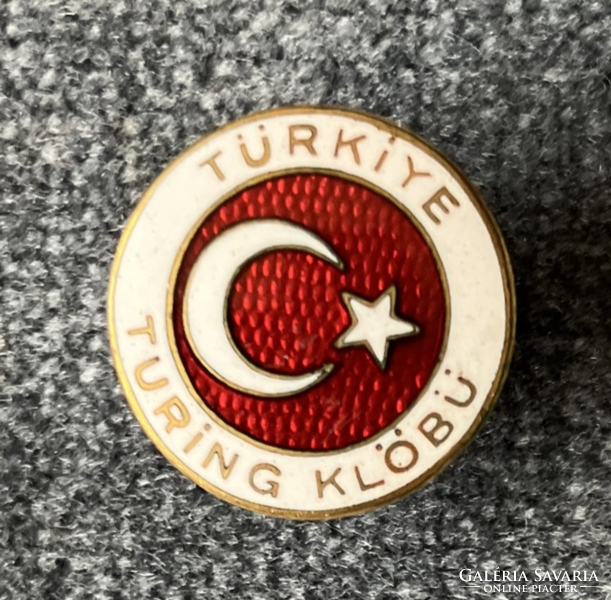 Enamel badge of a Turkish travel agency