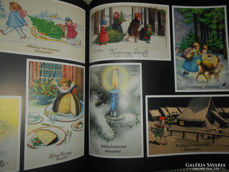 Christmas on old postcards, a collection of old Christmas postcards in a book