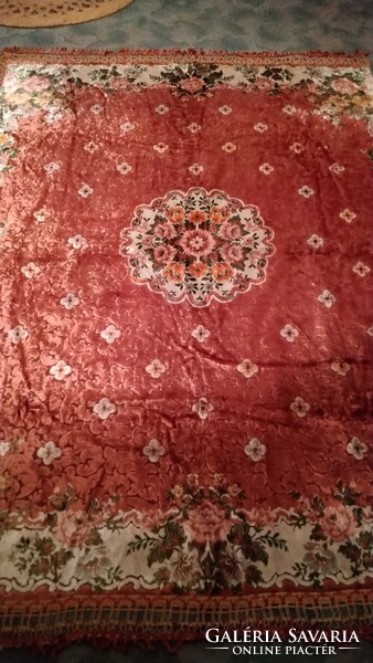 Carpeted bedspread and tablecloth or tapestry