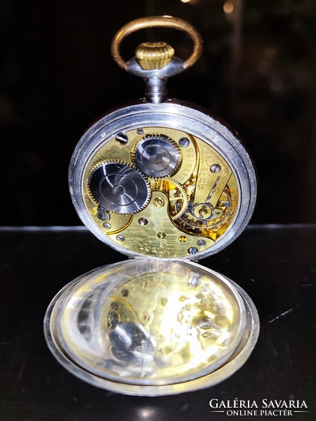 Silver omega pocket watch