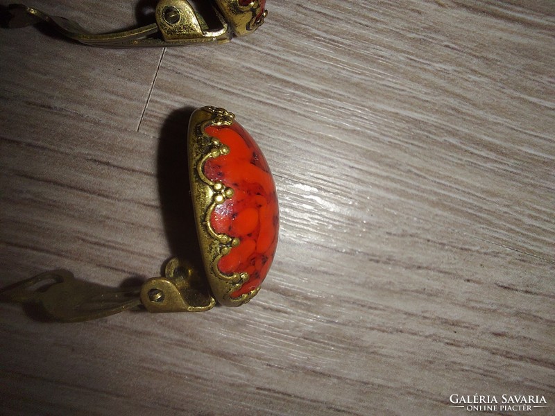 Pair of earring clips with red stones