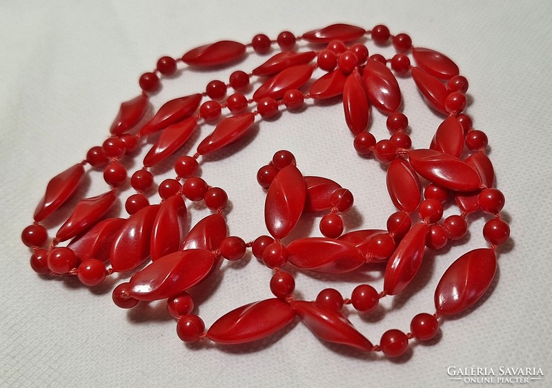 Vintage, long string of red pearls