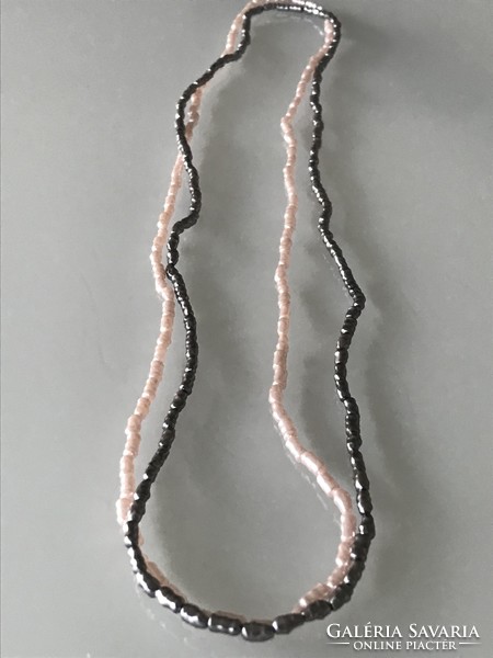 Necklaces with mother-of-pearl luster made of elongated beads, 76 cm long
