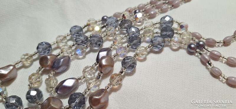 Three rows of old necklaces, string of pearls