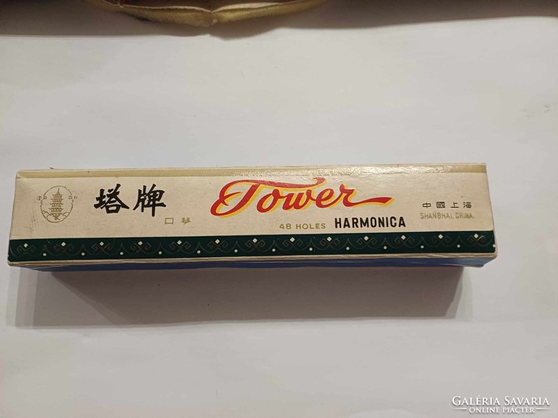 Old tower harmonica in its original box