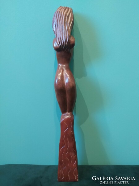 Female wooden sculpture.