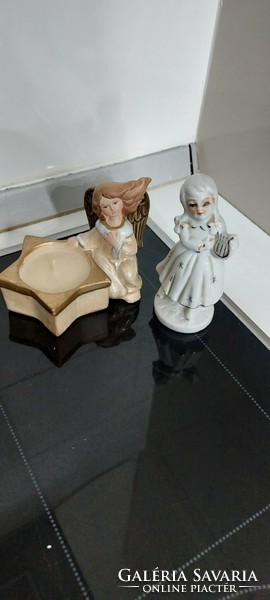 Set of angel figures holding candles