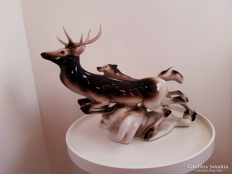 Royal dux Czech large porcelain figure of a wolf chasing a deer