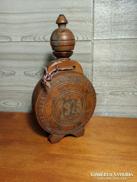 100-year-old carved coat of arms water bottle